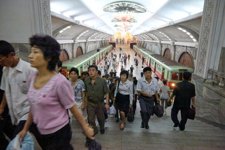 Commuters,At,Puhung,Metro,Station,In,Pyongyang,,North,Korea,September